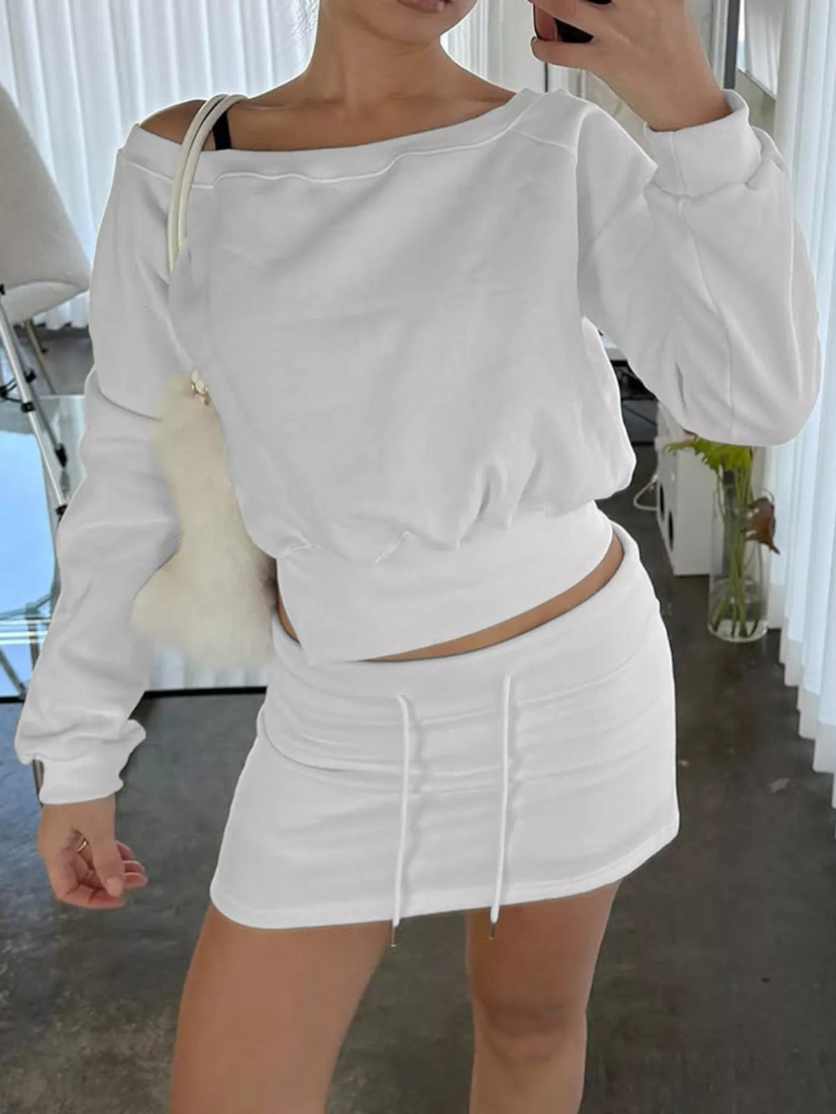 Grey sweatshirt and mini skirt set styled look