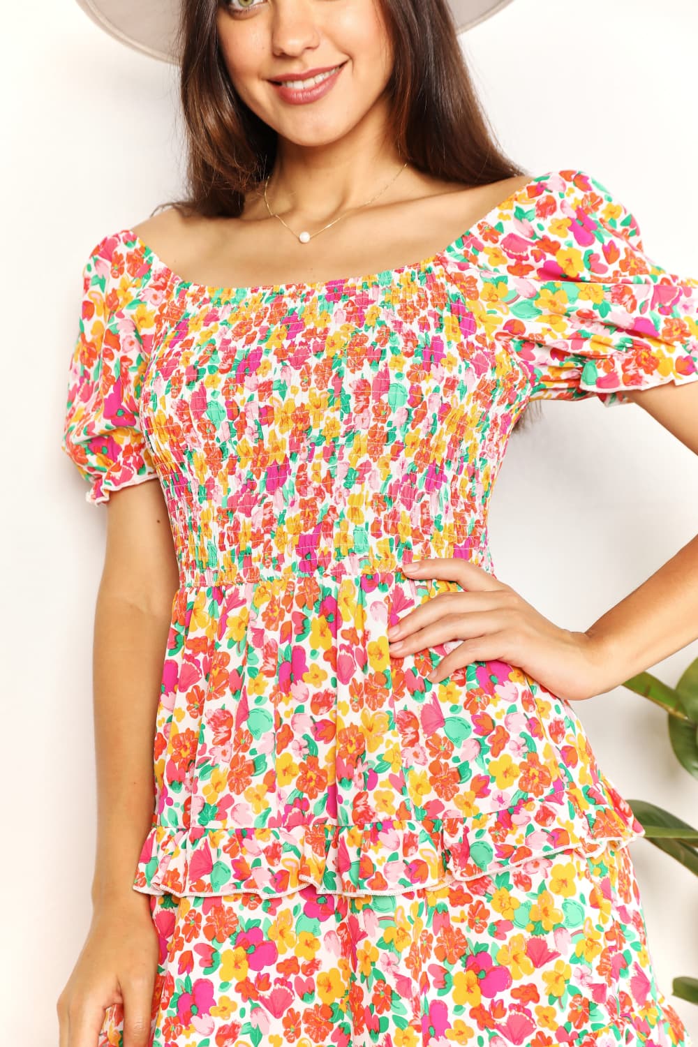Devine Smocked Sweetheart Neck Flounce Sleeve Mini Dress on model