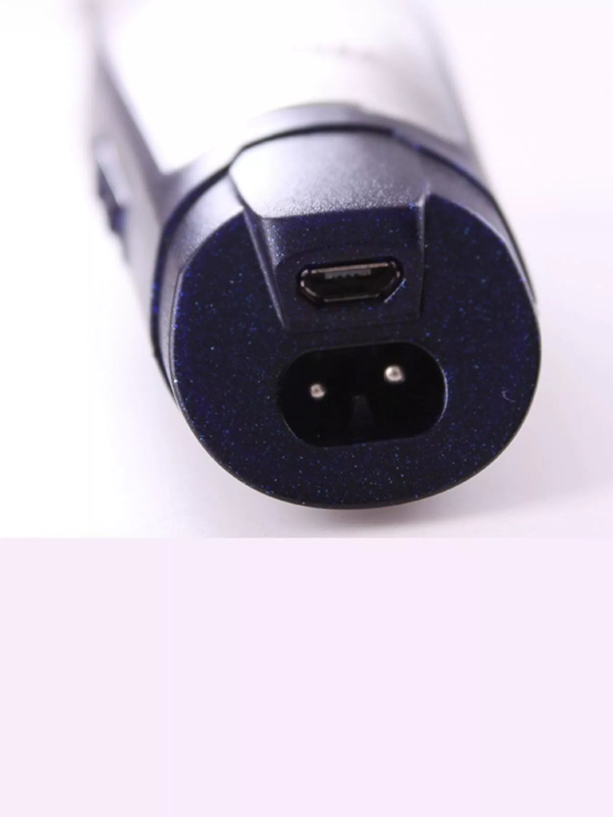 Hair clipper standing upright
