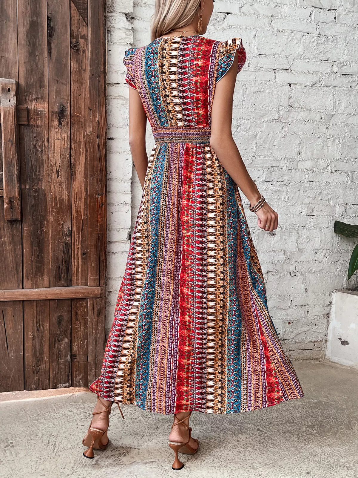 Boho print ruffle sleeve slit dress close up view