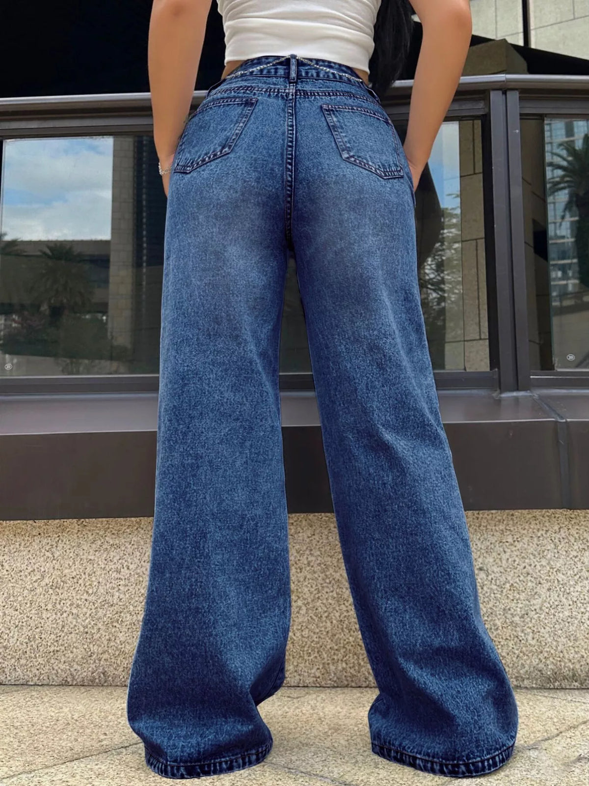Dark wash wide leg jeans styled detail view