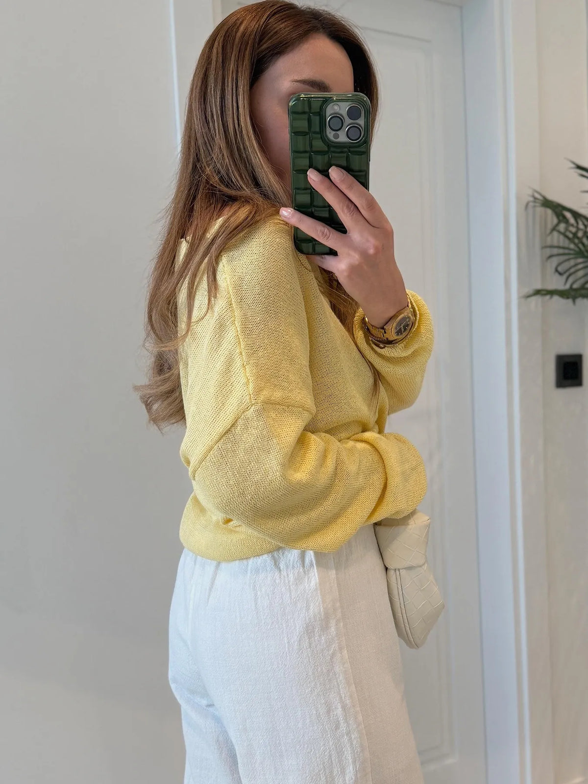 boat neck drop shoulder sweater side profile view