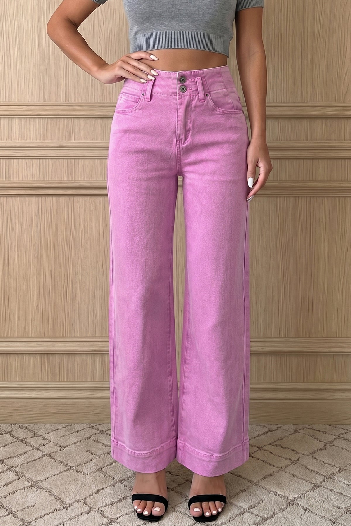 Pink high waist wide leg jeans front view on model