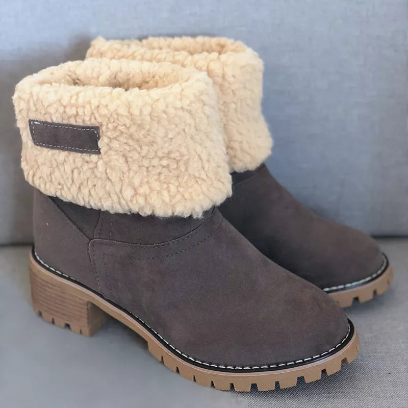 Suede round toe block heel boots three quarter view