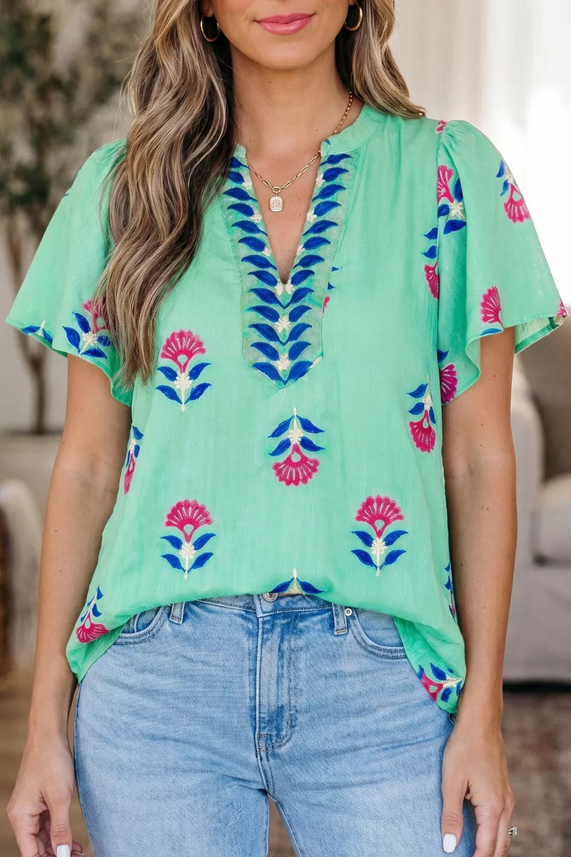 Turquoise floral V neck flutter sleeve blouse front view
