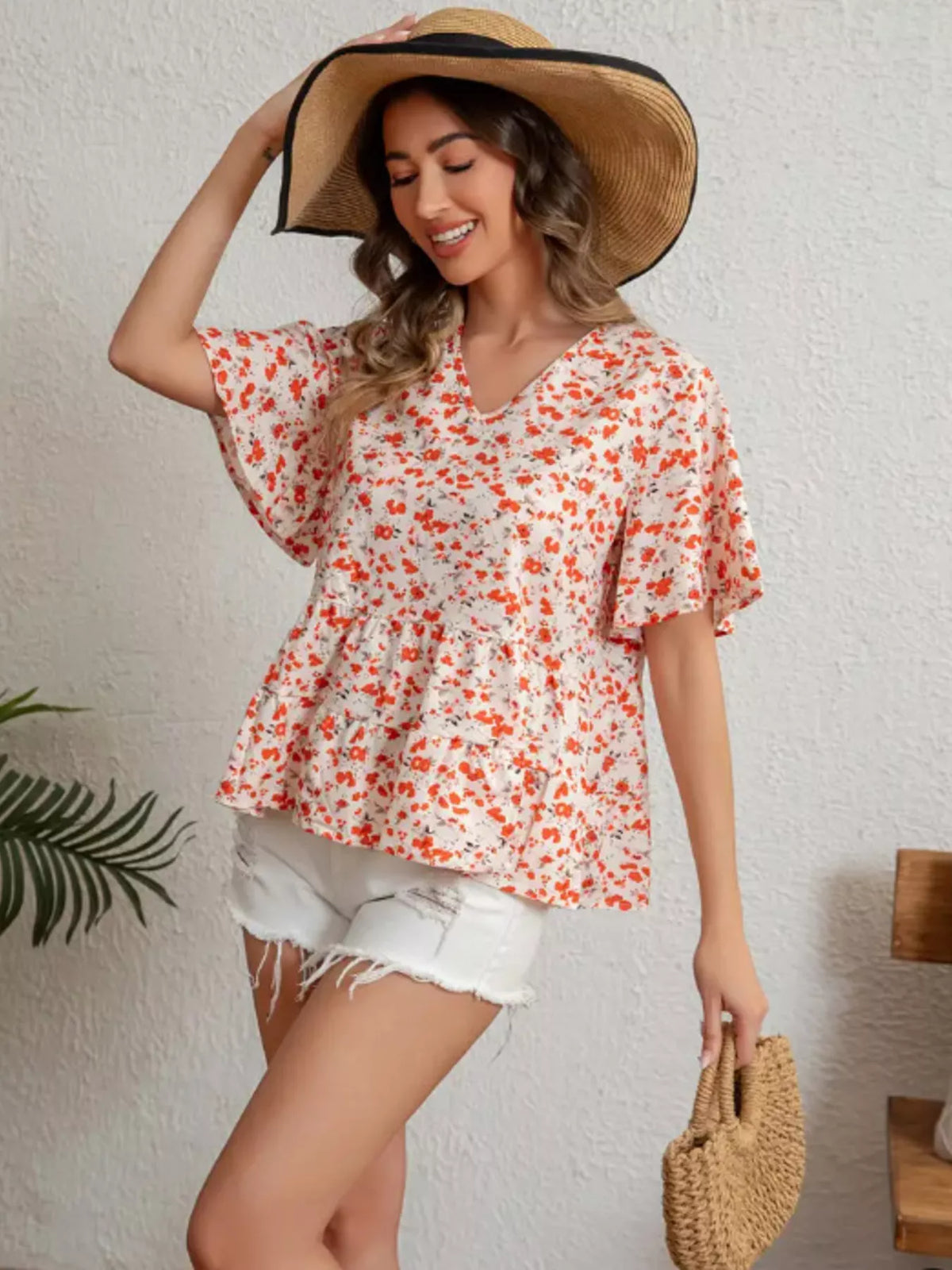 Floral print V neck ruffle sleeve peplum blouse styled view
