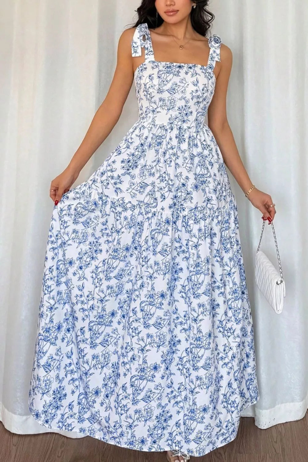 Light blue floral knot strap high waist flared maxi dress front view