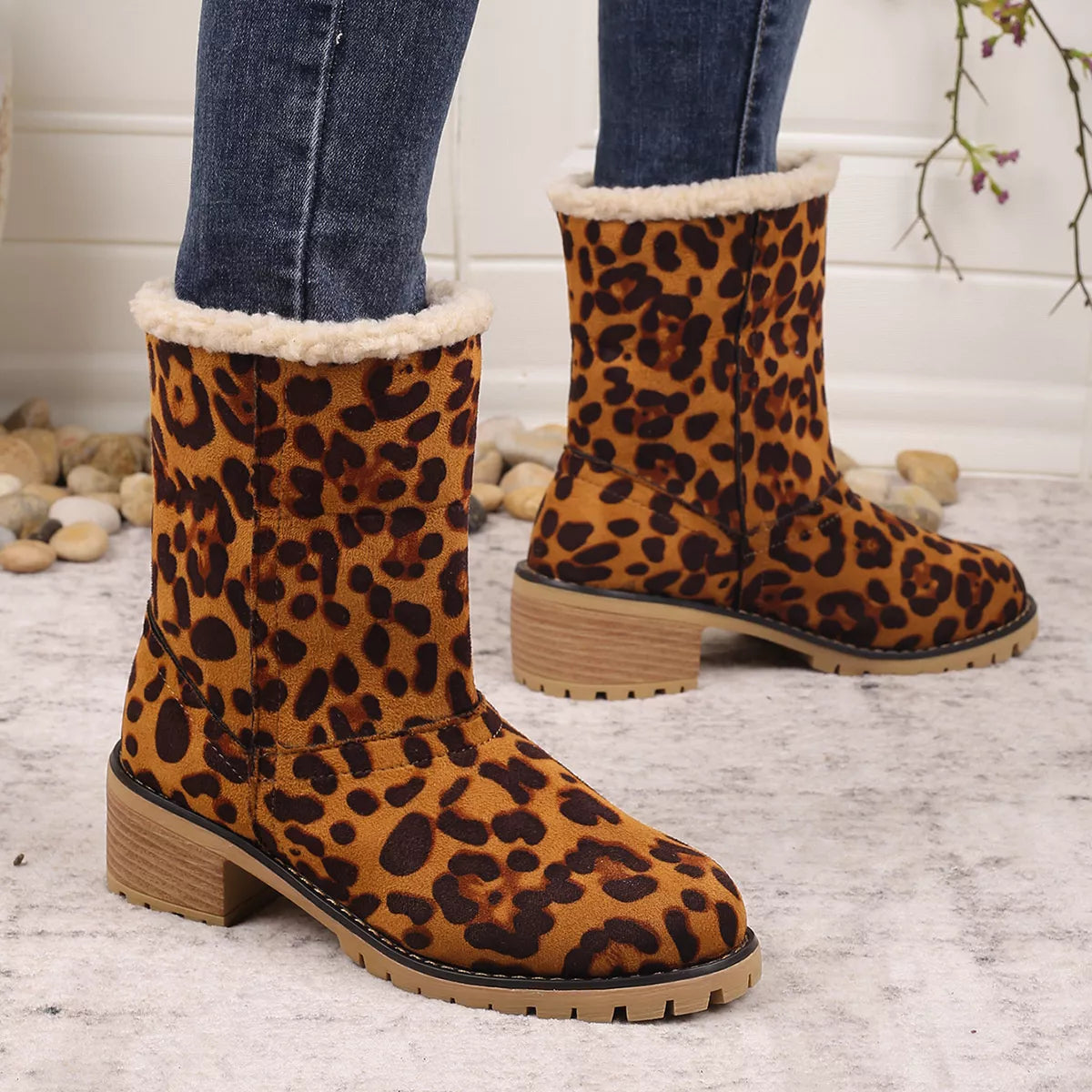 Leopard boots fastening detail