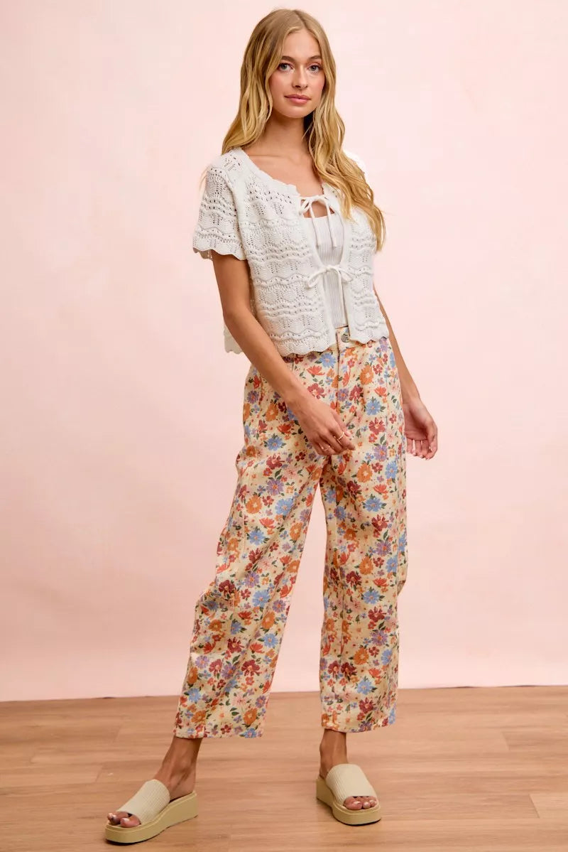 Walking view of the floral printed barrel leg pants