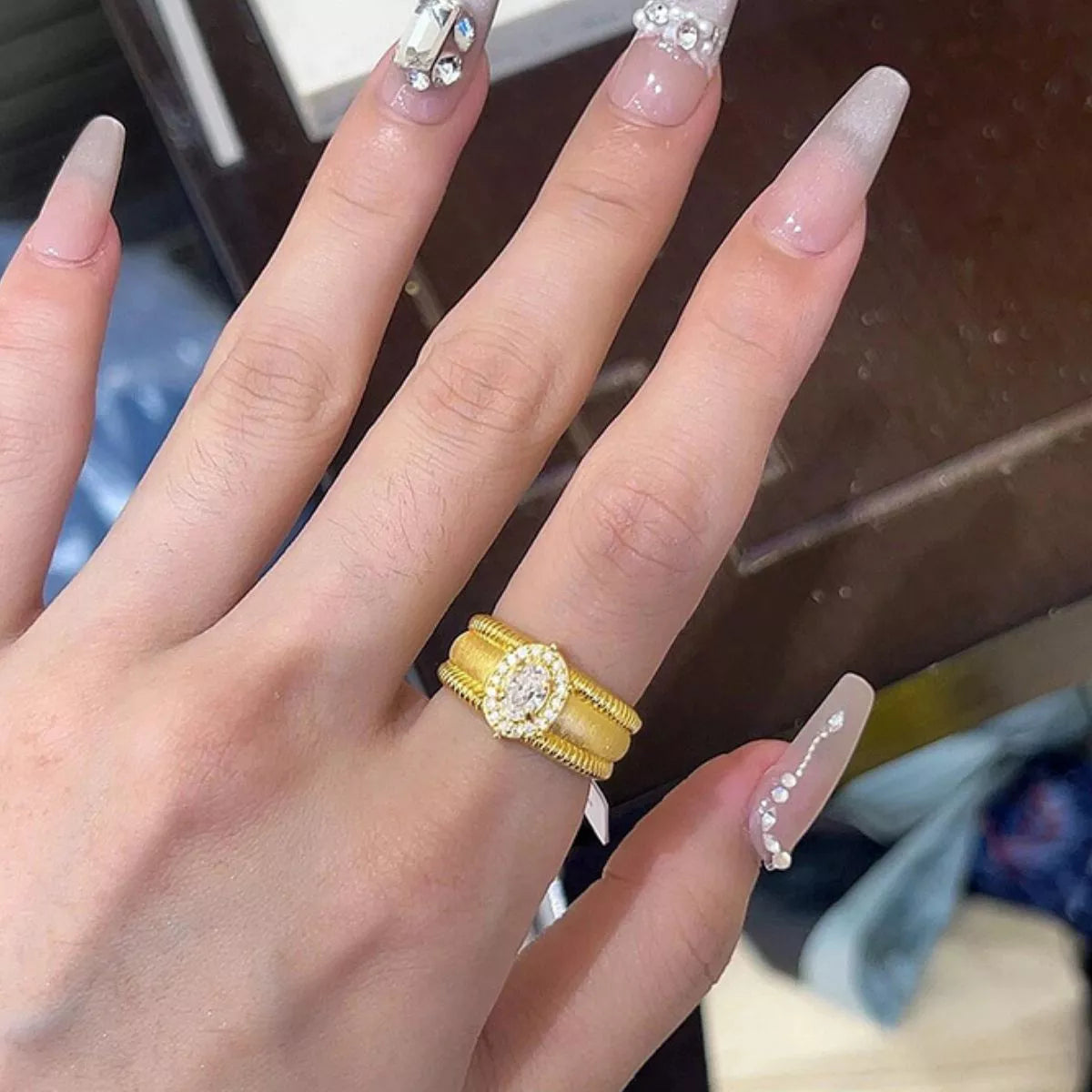 Ring shown with its matching box