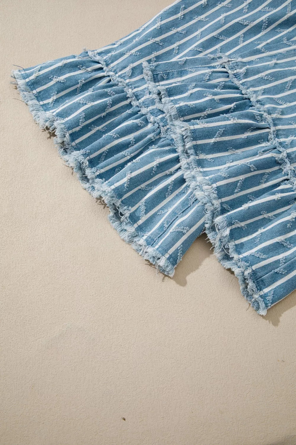 Ruffled overalls pocket detail