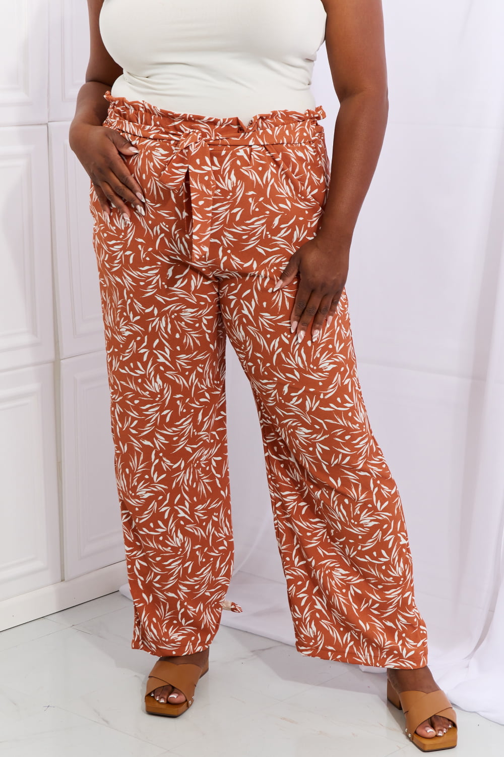 Full length view of the printed pants styled with a top