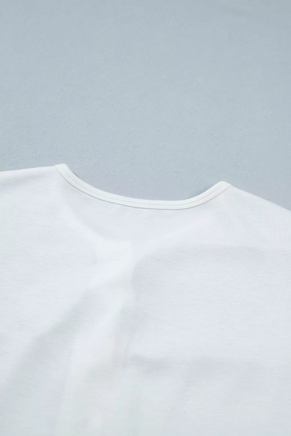 White floral tee sleeve detail
