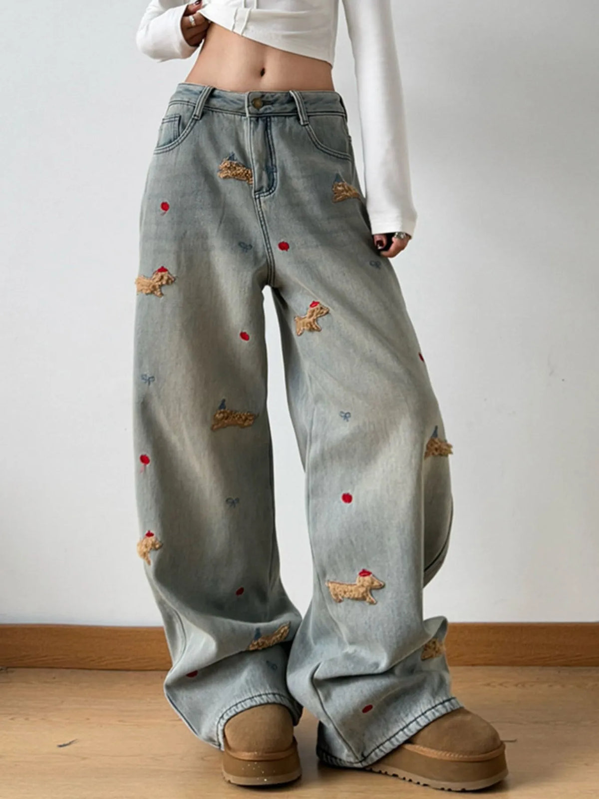 Embroidered wide leg jeans in light wash front view