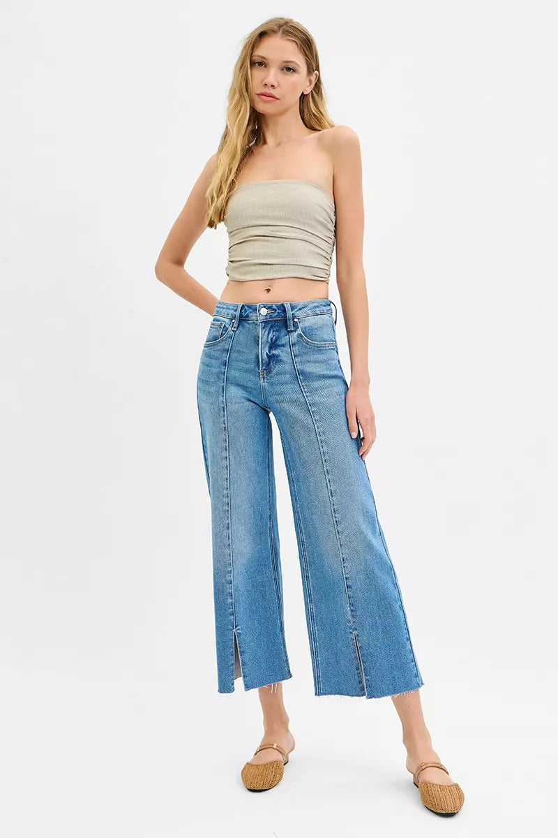 Model wearing RISEN cropped wide leg front slit jeans styled look
