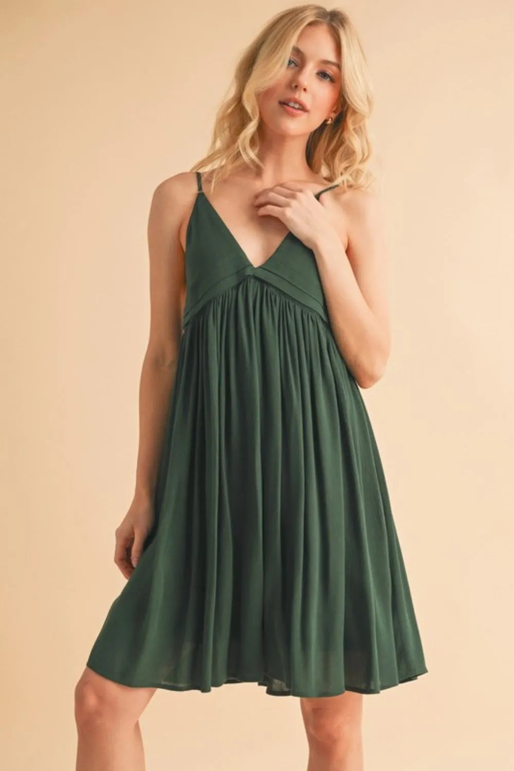 Ruched plunge mini cami dress in dark green front view