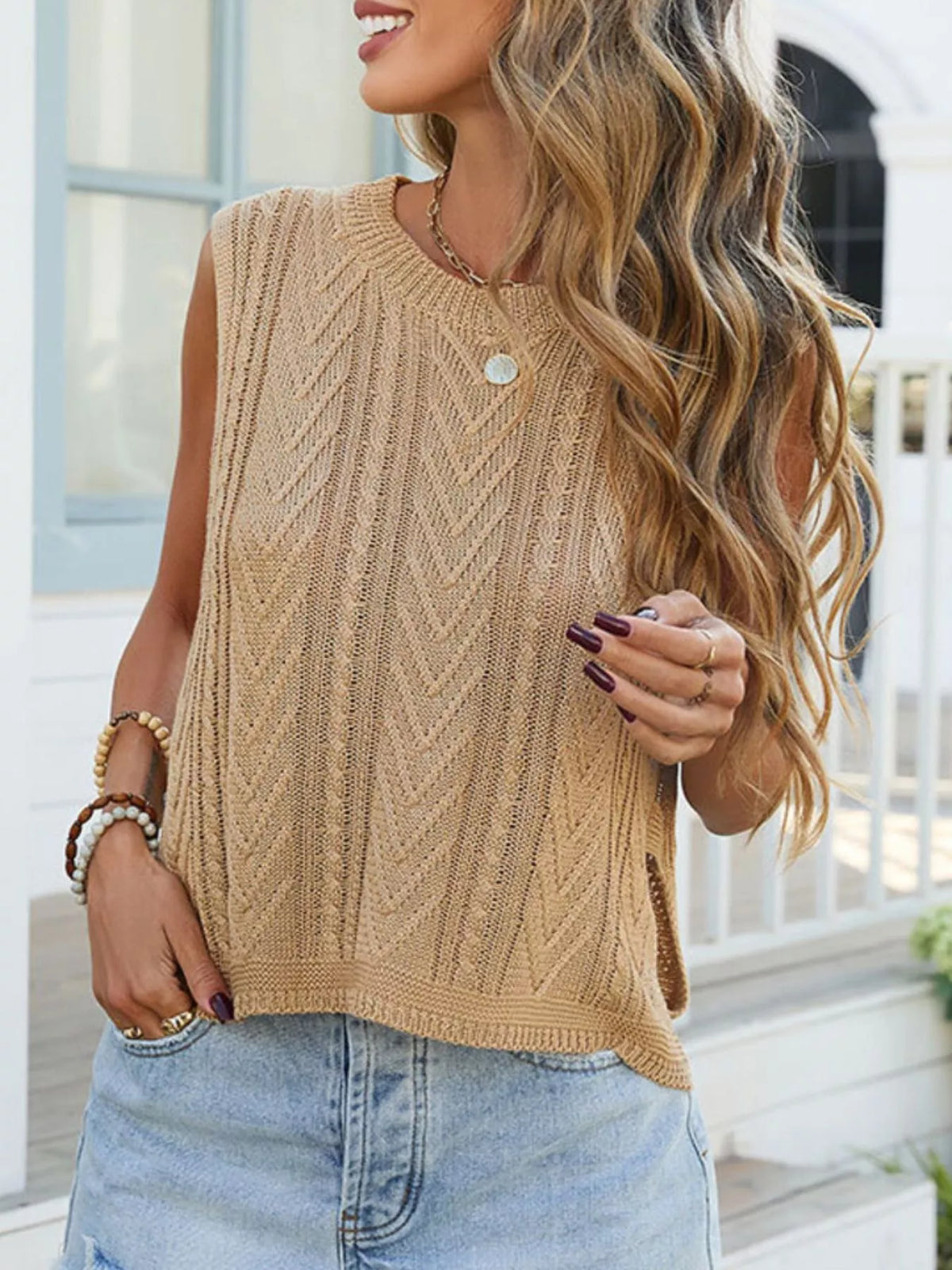 Cable knit round neck sweater vest back view