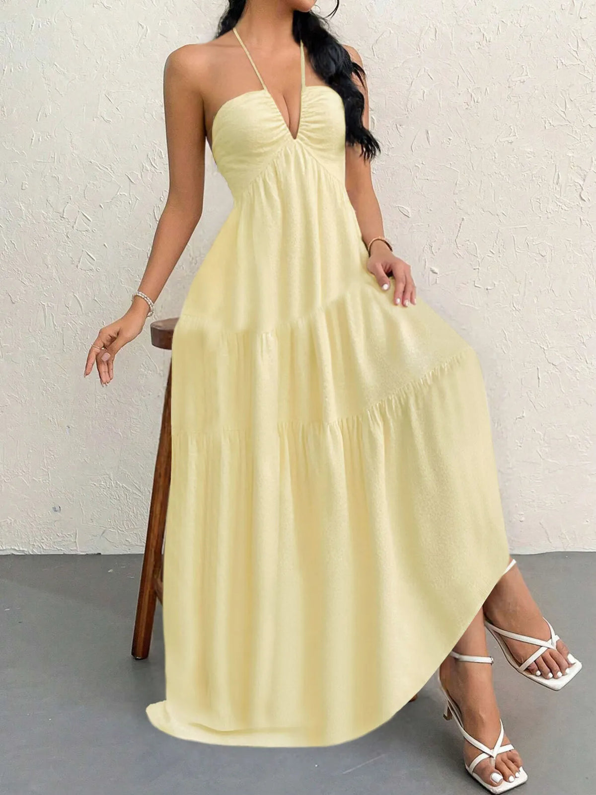 halter neck tiered backless maxi dress on model