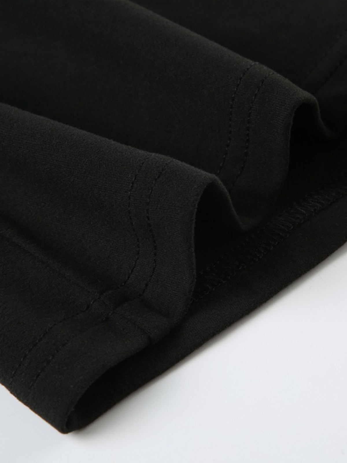 long sleeve ruched romper close up detail