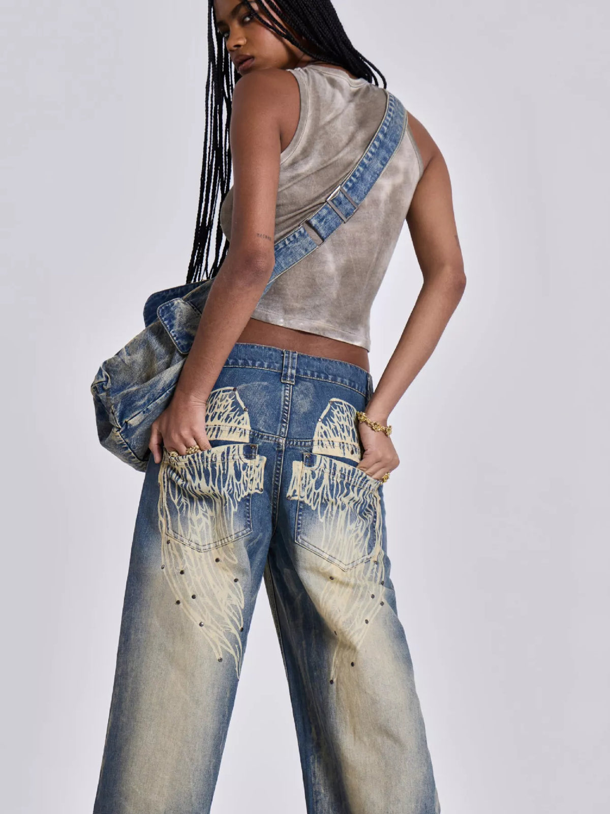 Back view of studded wide leg jeans