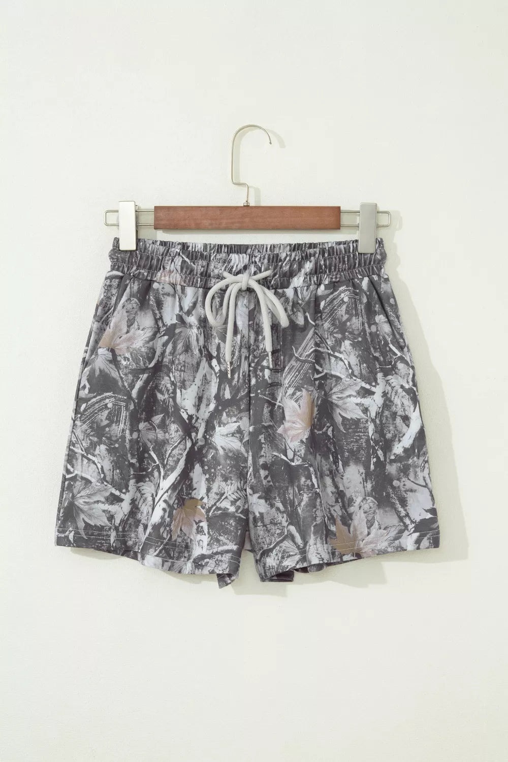Grey abstract maple leaf print drawstring shorts back view