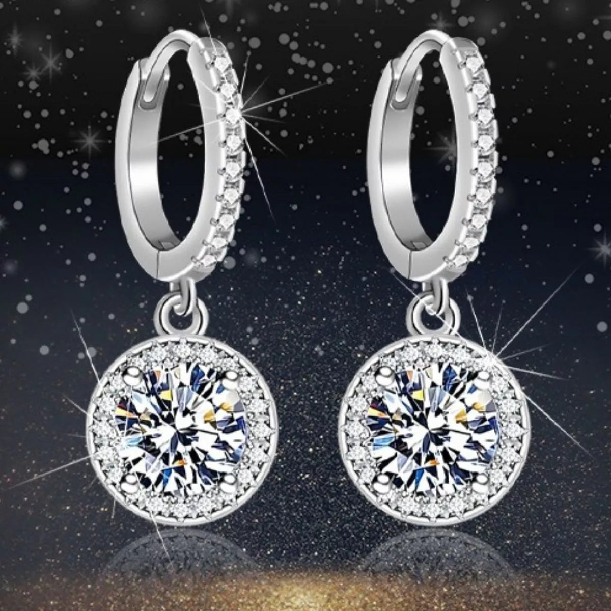 Close up of the moissanite drop on the silver hoop