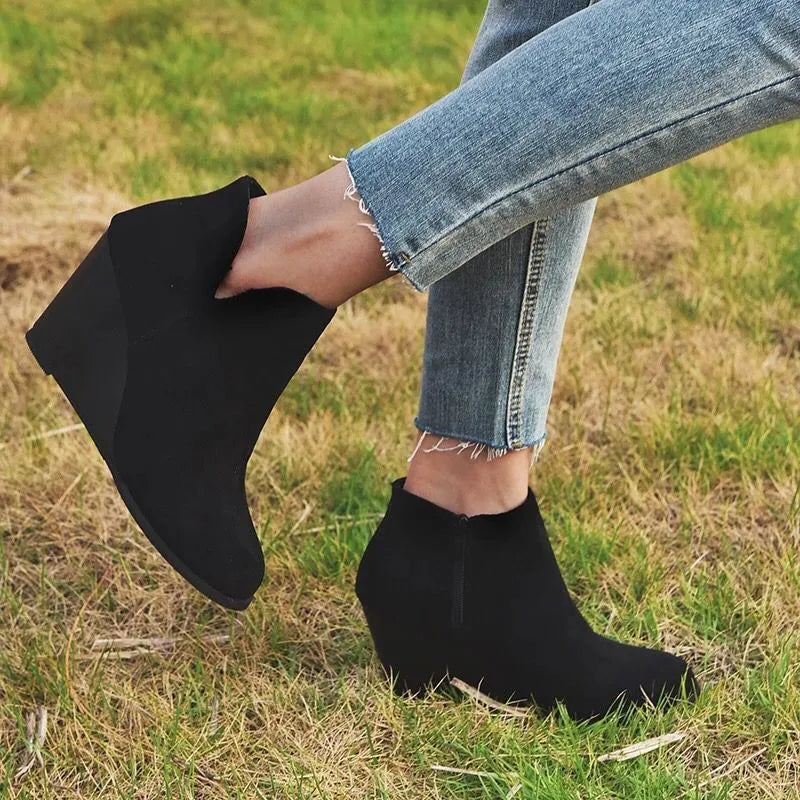 Leopard high heel ankle boots with side zip front facing view