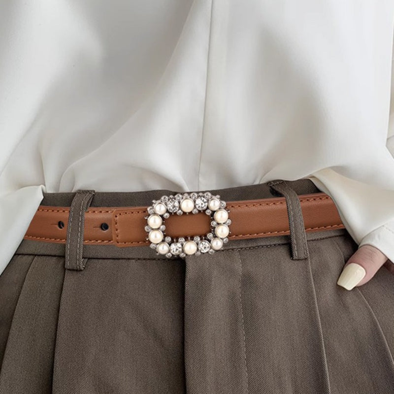 Pearl buckle leather belt coiled flat