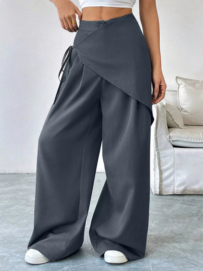 Gray asymmetrical wrap wide leg pants, full front view