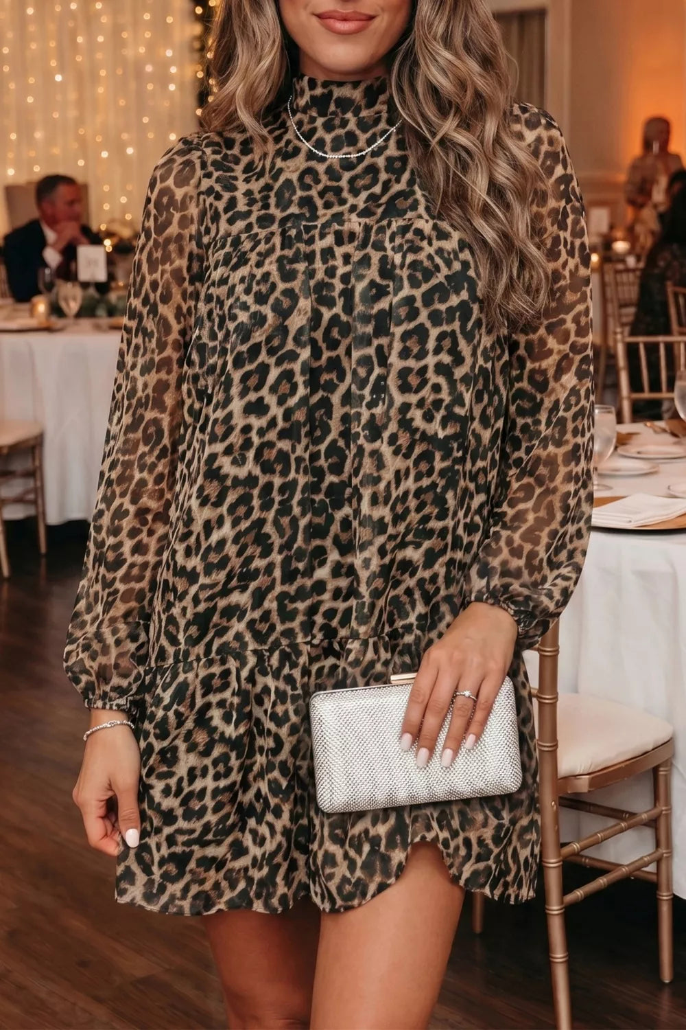 Tiered leopard dress shown at a side angle