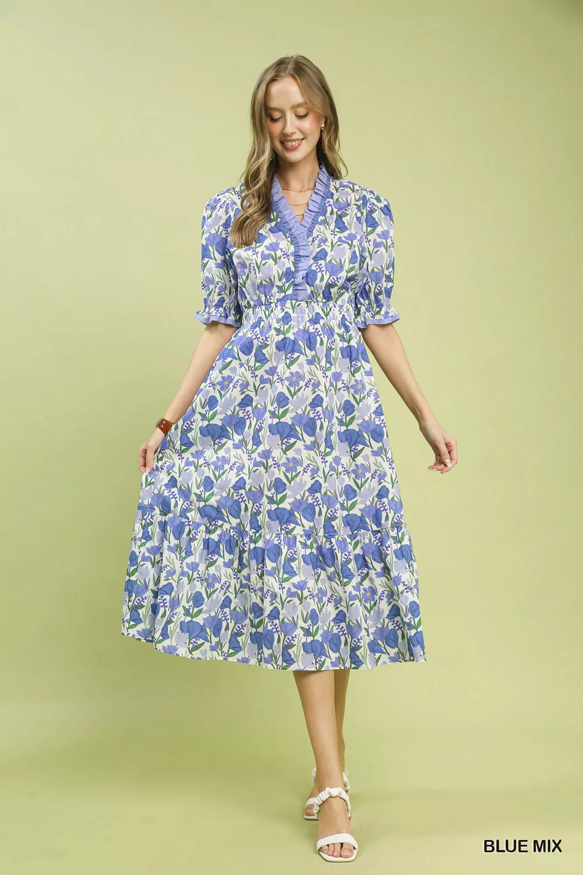 Back view of the floral ruffle trim tiered midi dress