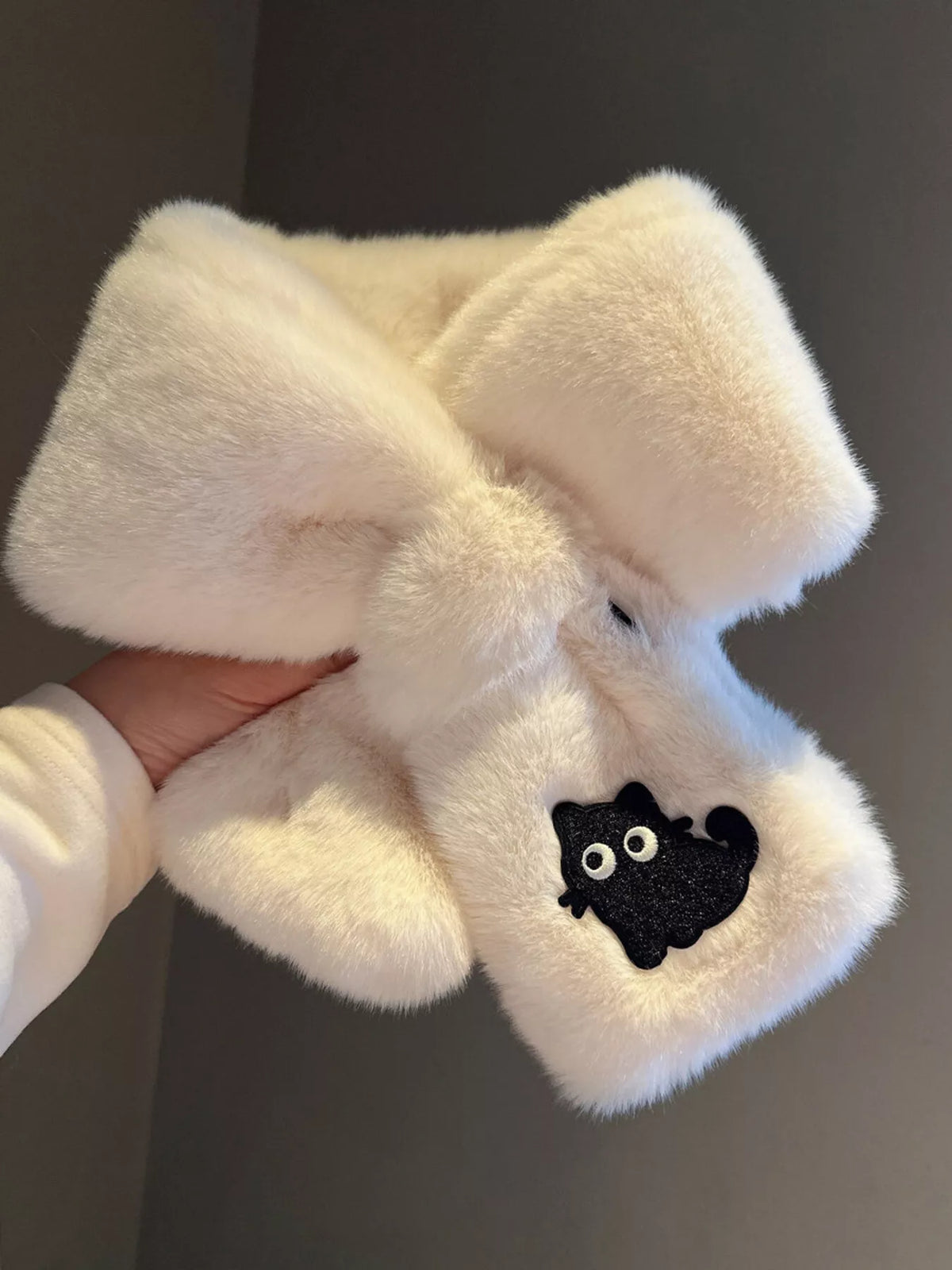 Cat embroidered plush scarf wrapped around the neck
