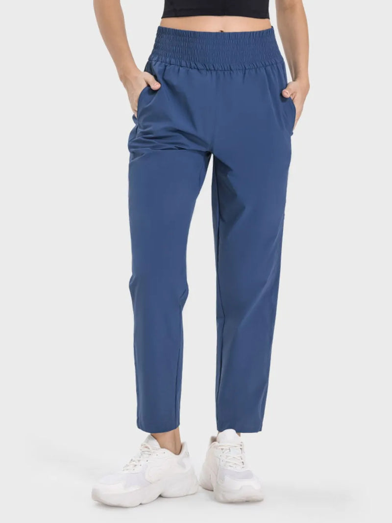 Peacock blue high waist active pants front view