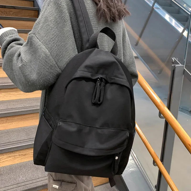 Cotton zip top backpack front pocket detail