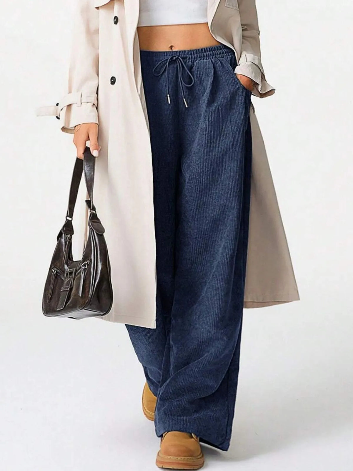 Drawstring wide leg pants standing pose