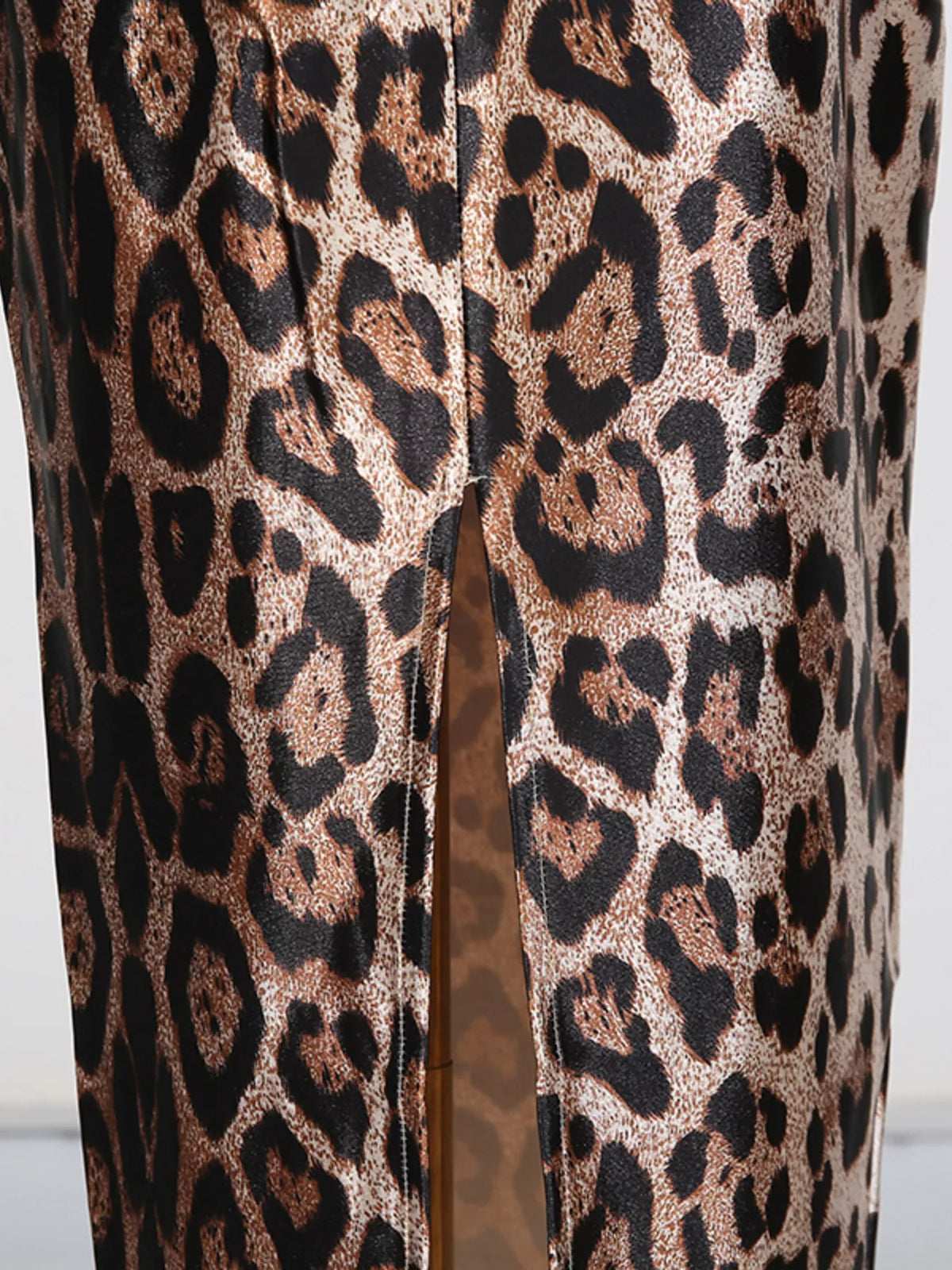 Leopard print bodycon midi dress movement shot