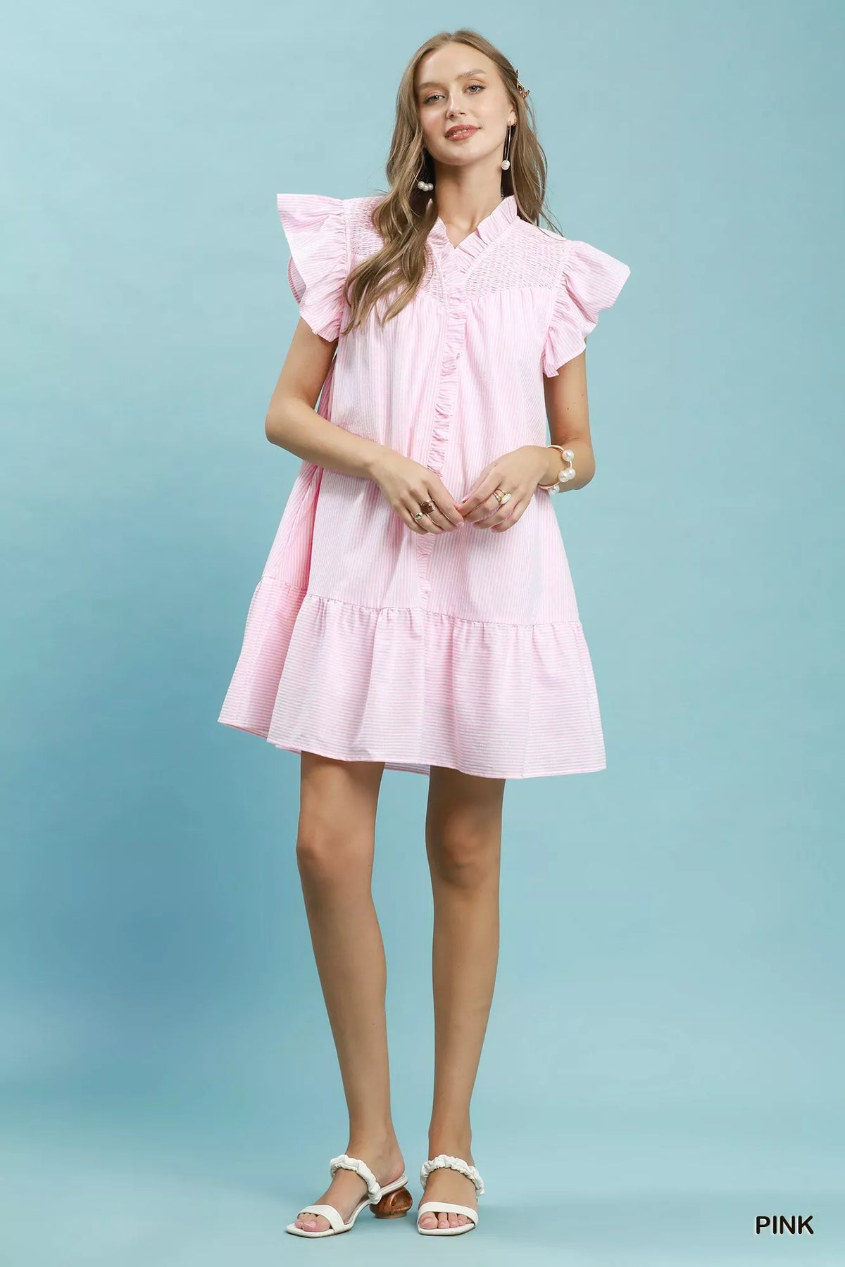 Pink striped smocked yoke ruffle dress detail view