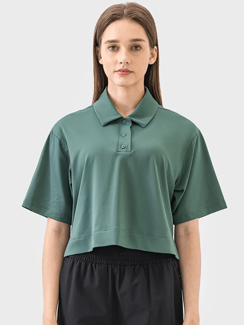 Half button short sleeve active tee close up detail