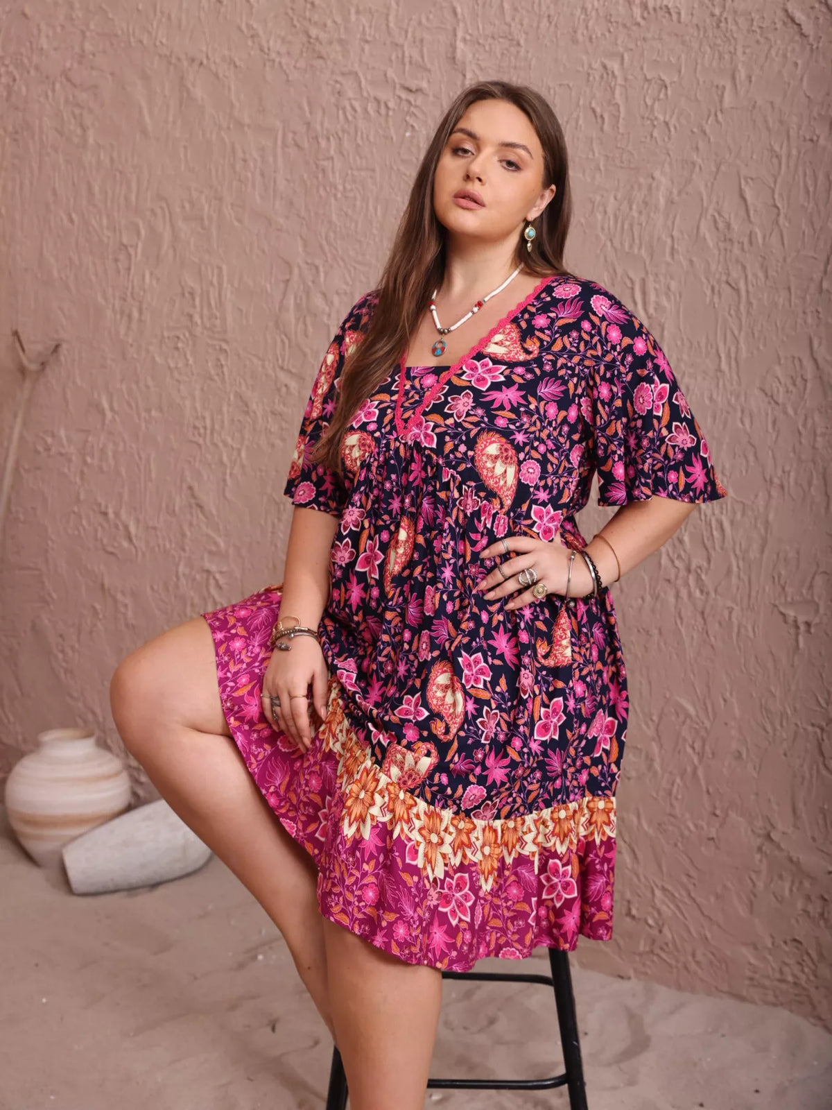 Floral flutter sleeve dress side view