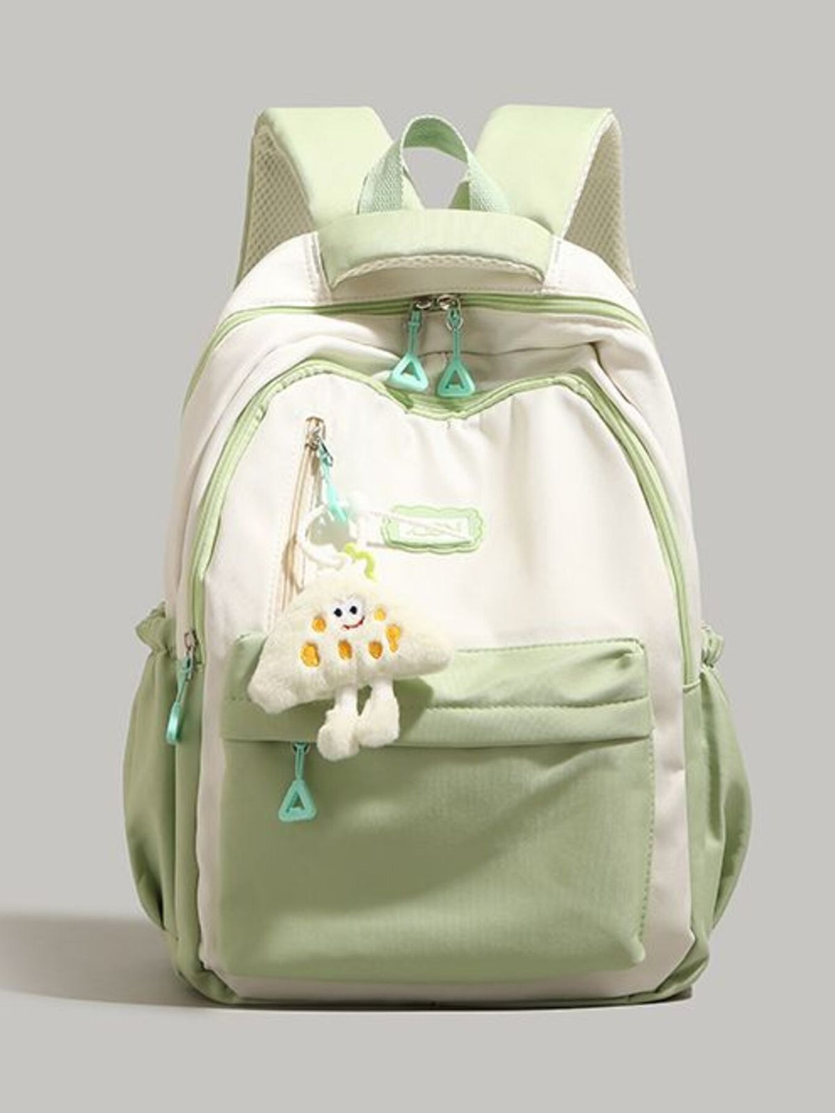 Light green color block nylon backpack front view