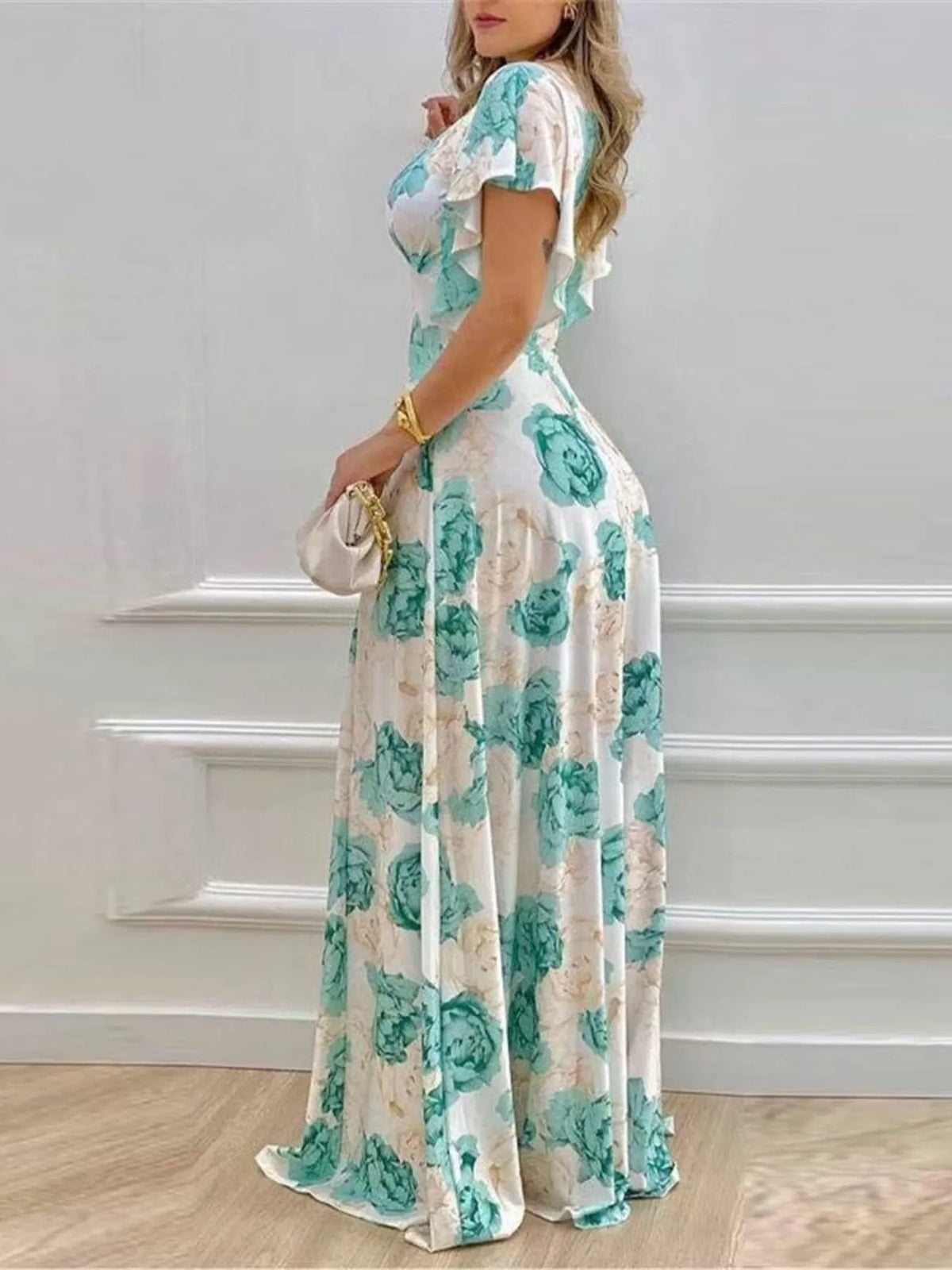 Plus size floral v neck maxi dress in light green three quarter view
