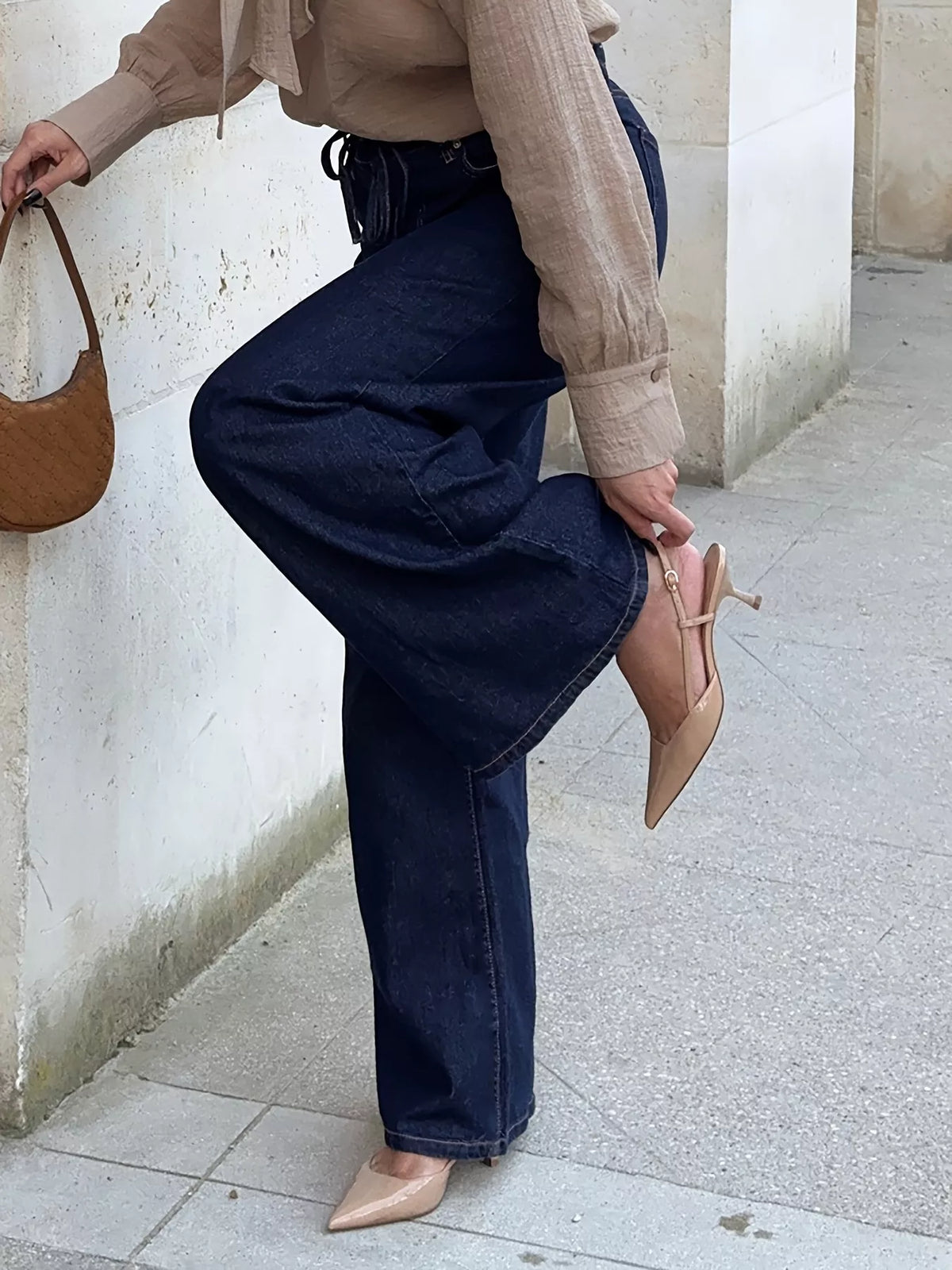 Dark blue flare denim side profile