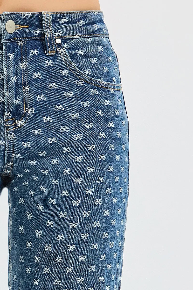 Model wearing RISEN bow embroidered wide leg jeans styled look