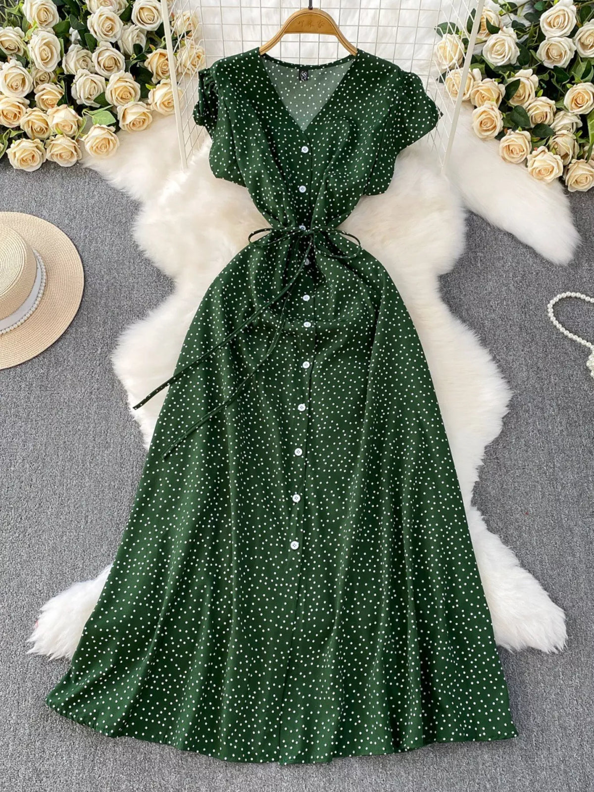Green polka dot button up belted maxi dress front view