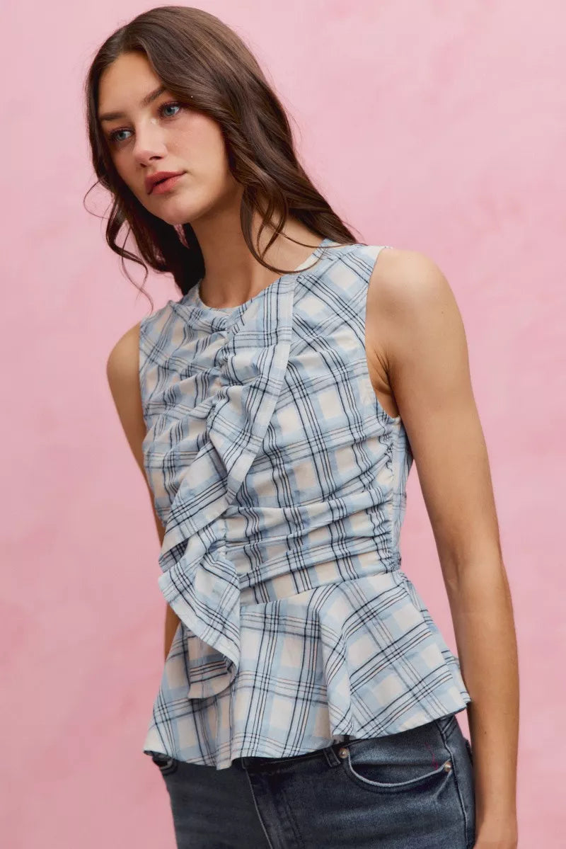 Blue plaid sleeveless ruffle peplum top front view