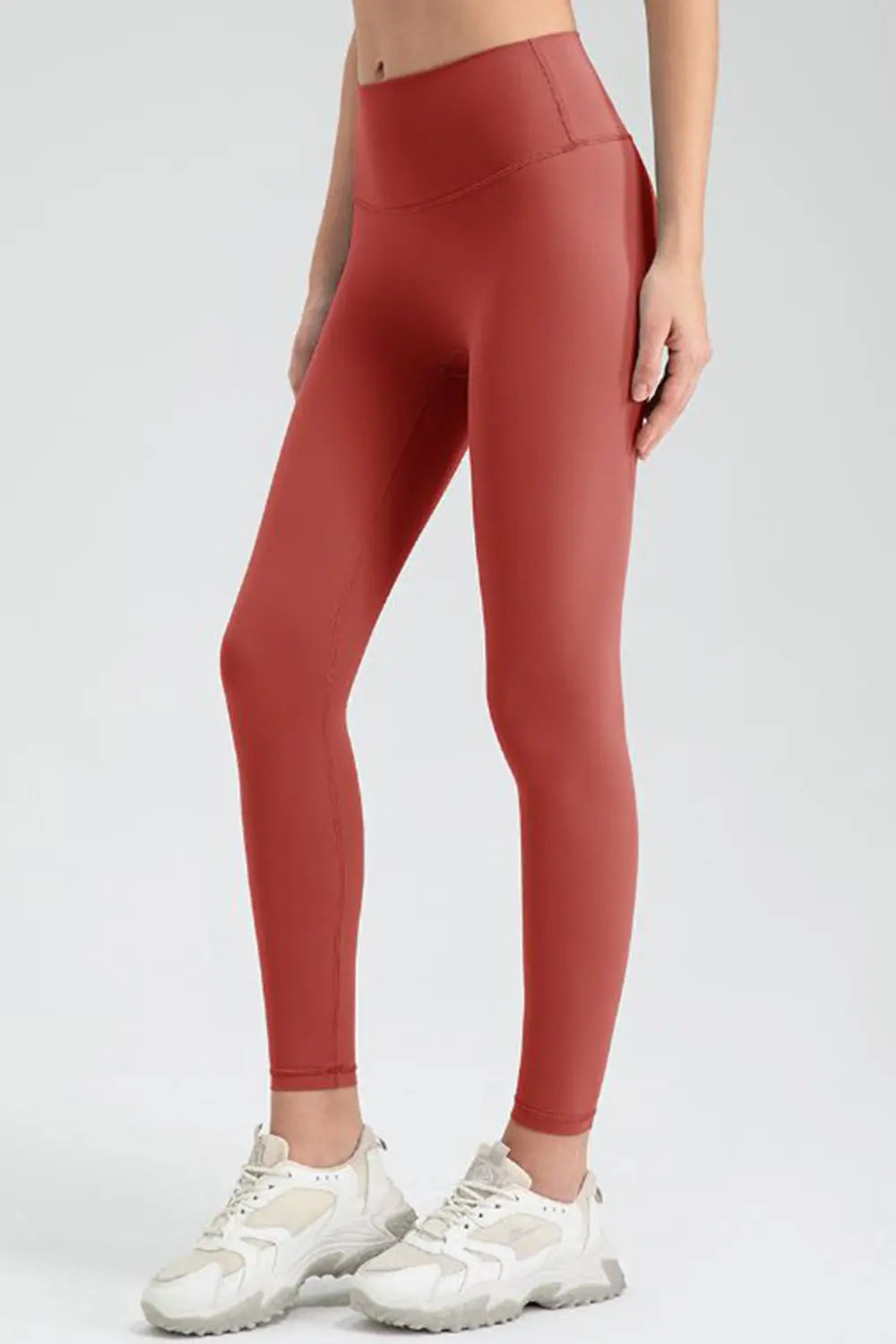 wide waistband sport leggings worn with denim