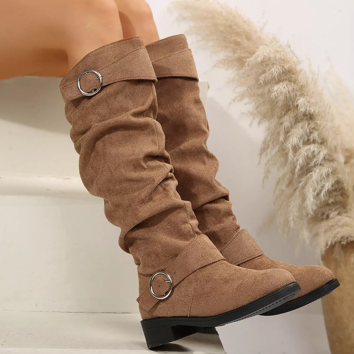 Khaki buckle accent slouch boots heel detail