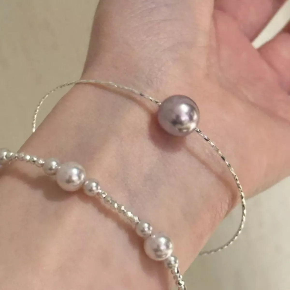 Silver pearl bangle bracelet pearl detail view