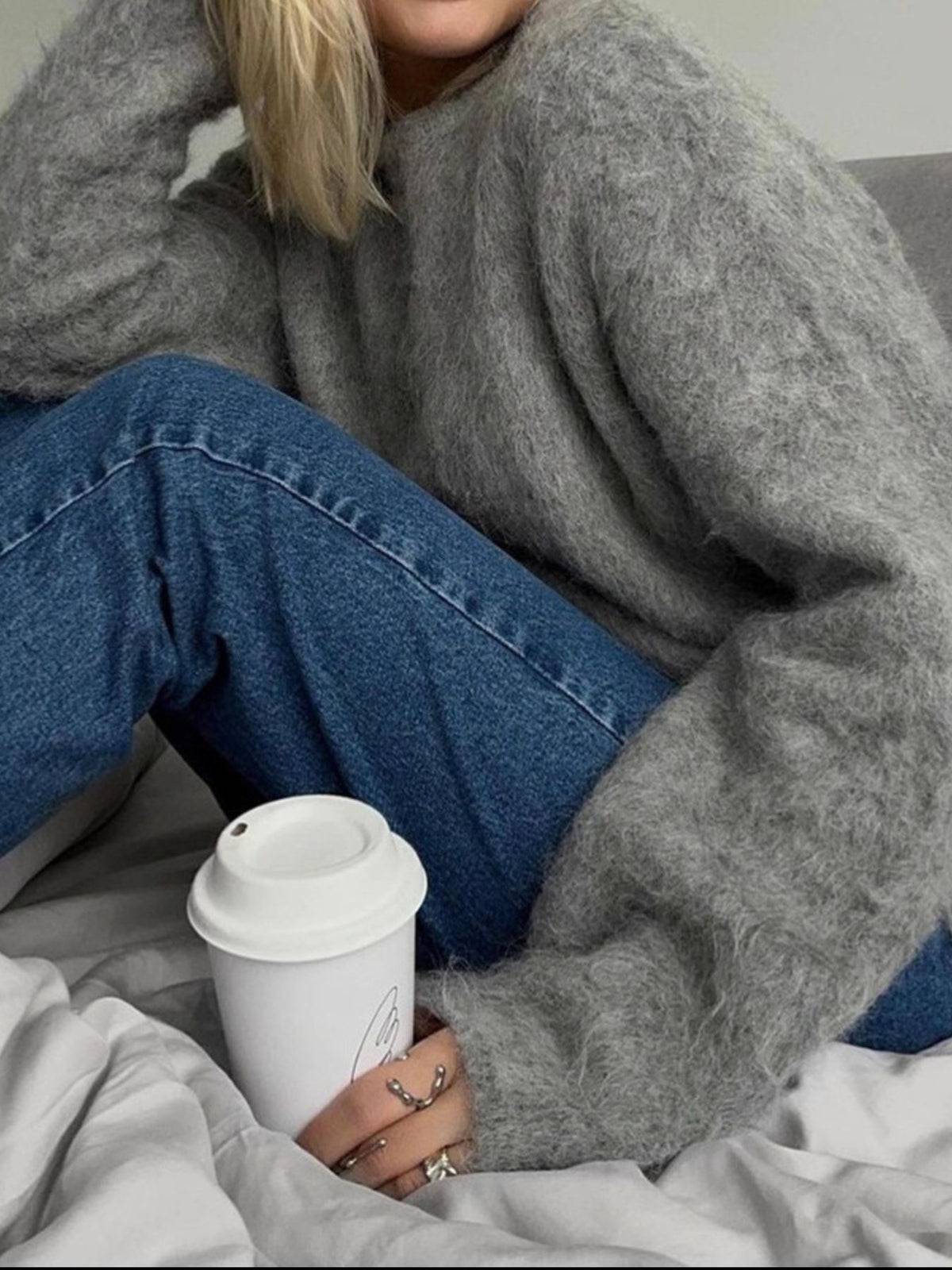 Milky white fuzzy sweater soft texture detail