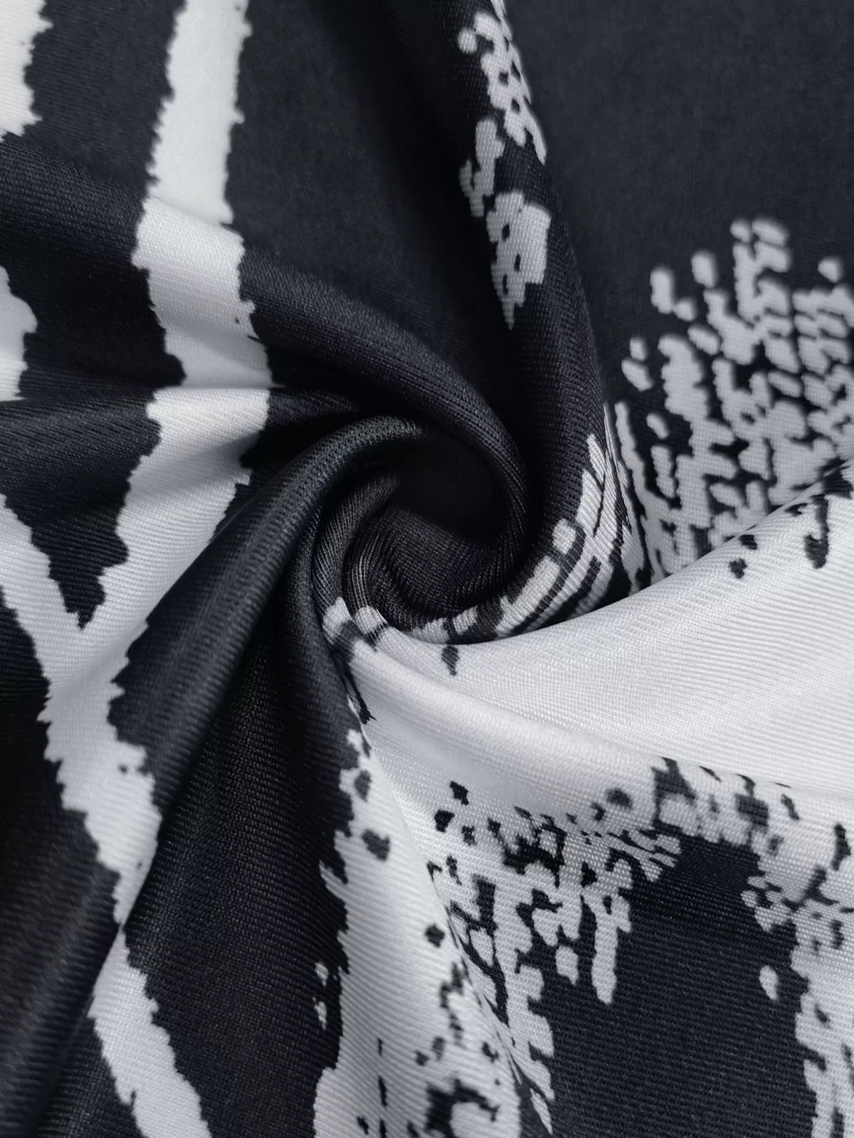 black abstract print bodycon maxi dress three quarter view